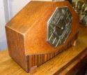 Striking Art Deco Mantle Clock with mixed wood and brass detail side view